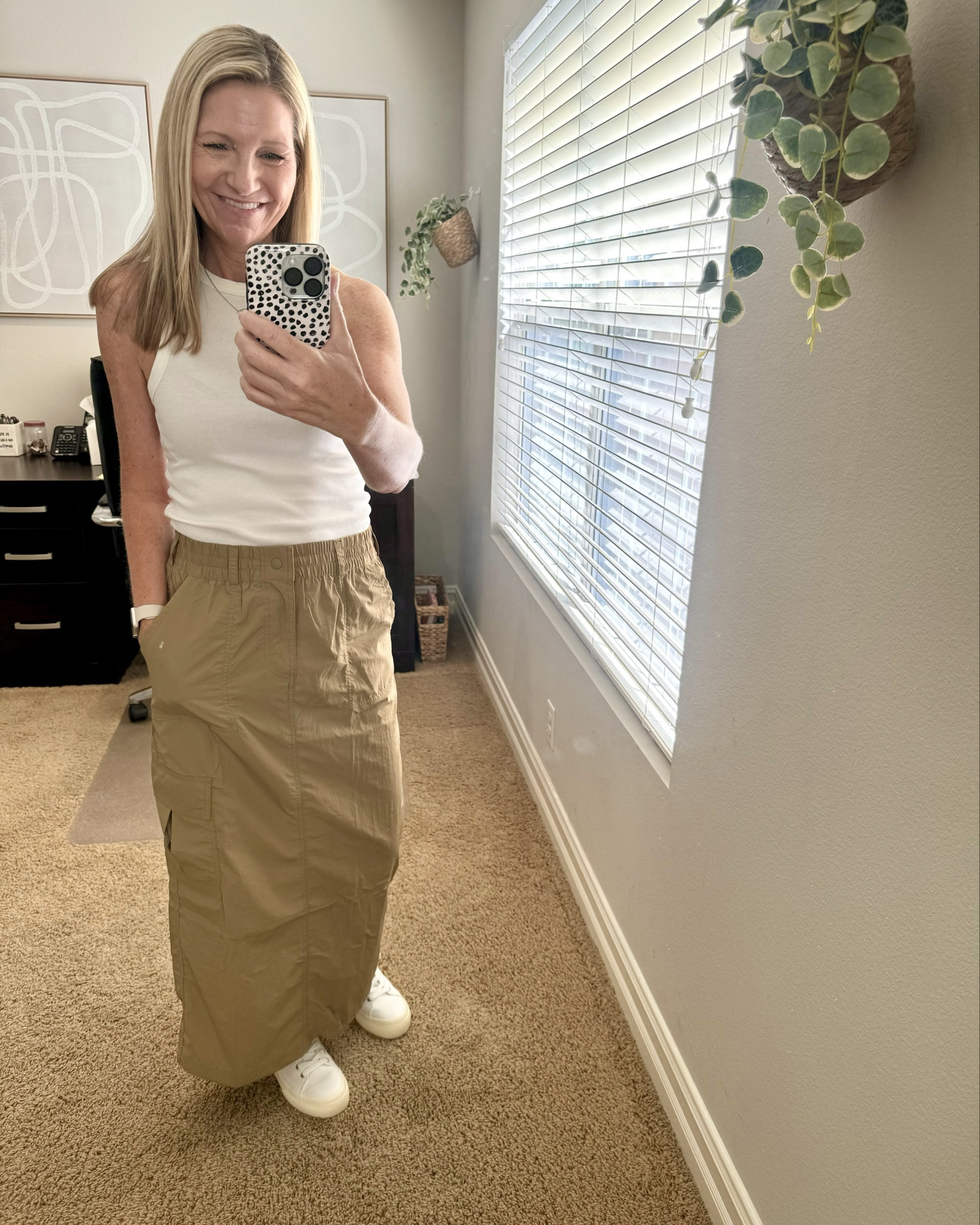Just got my recent Aerie order in and immediately had to try on this maxi skirt. The material is shiny and similar to track pants but it’s super comfortable and easy to throw on and look put together. Plus, it’s on sale right now and comes in multiple colors. I ordered my true size Small but could have also done an XS. 

My favorite Target tank in white is just $8. My Sam Edelman sneakers are part of the Nordstrom Anniversary Sale. 

Shared a little denim jacket on top in the second pic as this skirt will easily transition to Fall. 

#LTKActive #LTKxNSale #LTKSaleAlert