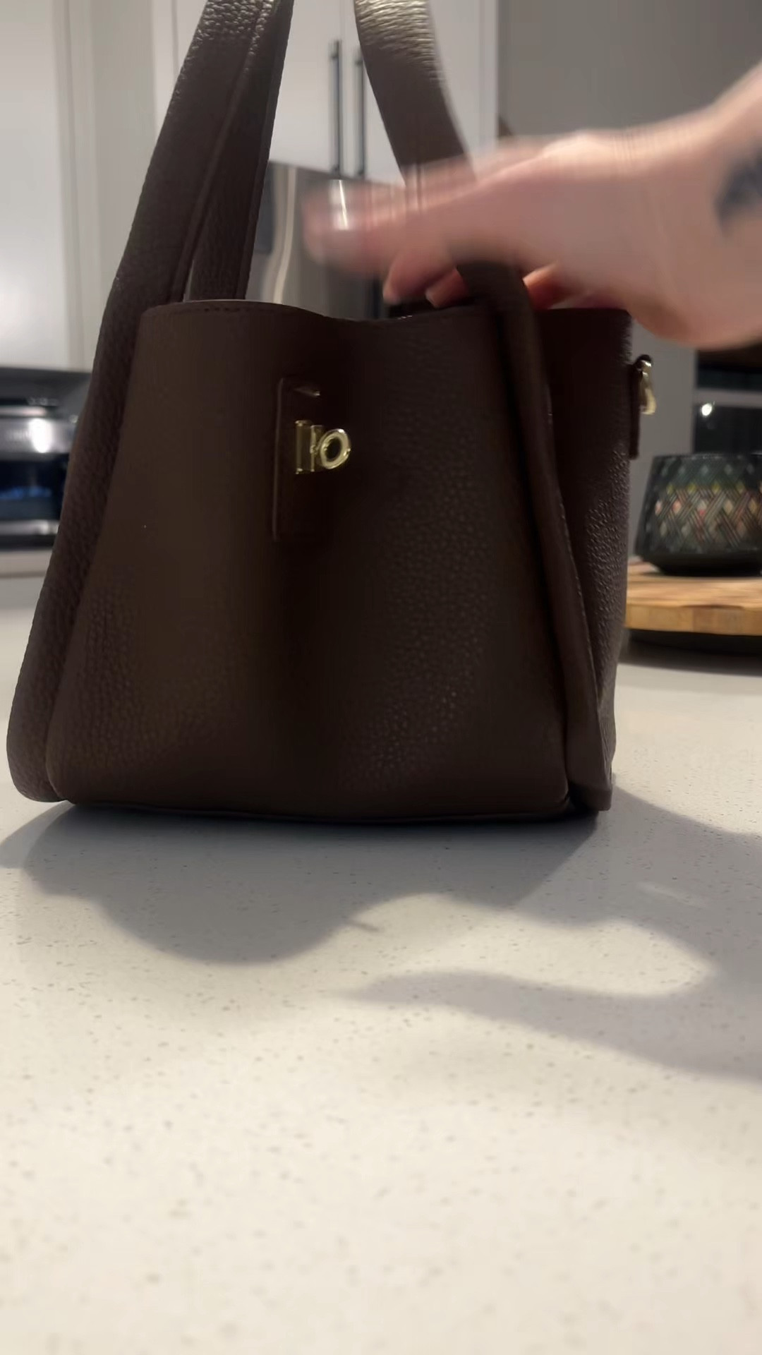 Super cute brown bucket purse with makeup bag and a long strap option 

#LTKFindsUnder50 #LTKStyleTip #LTKItBag