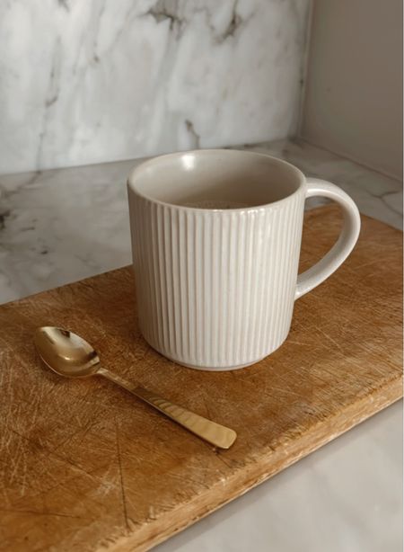 Ribbed off white coffee mugs
Gold mini spoons

Vintage French breadboard 


#LTKover40 #LTKfindsunder50 #LTKhome