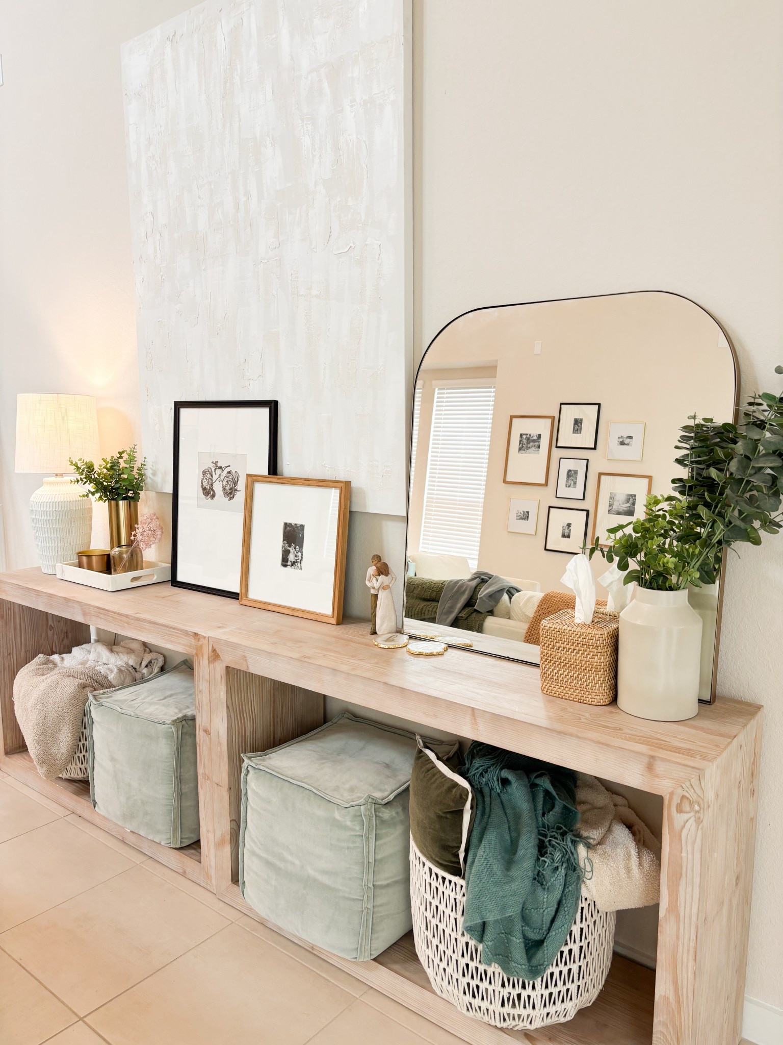 The perfect way to fill up a large blank wall is with a mix of heights, dimensions and colors. I’ve loved these pottery barn tables for years now and the accents make the room feel put together and cozy! Function style! 

#LTKHome #LTKSaleAlert