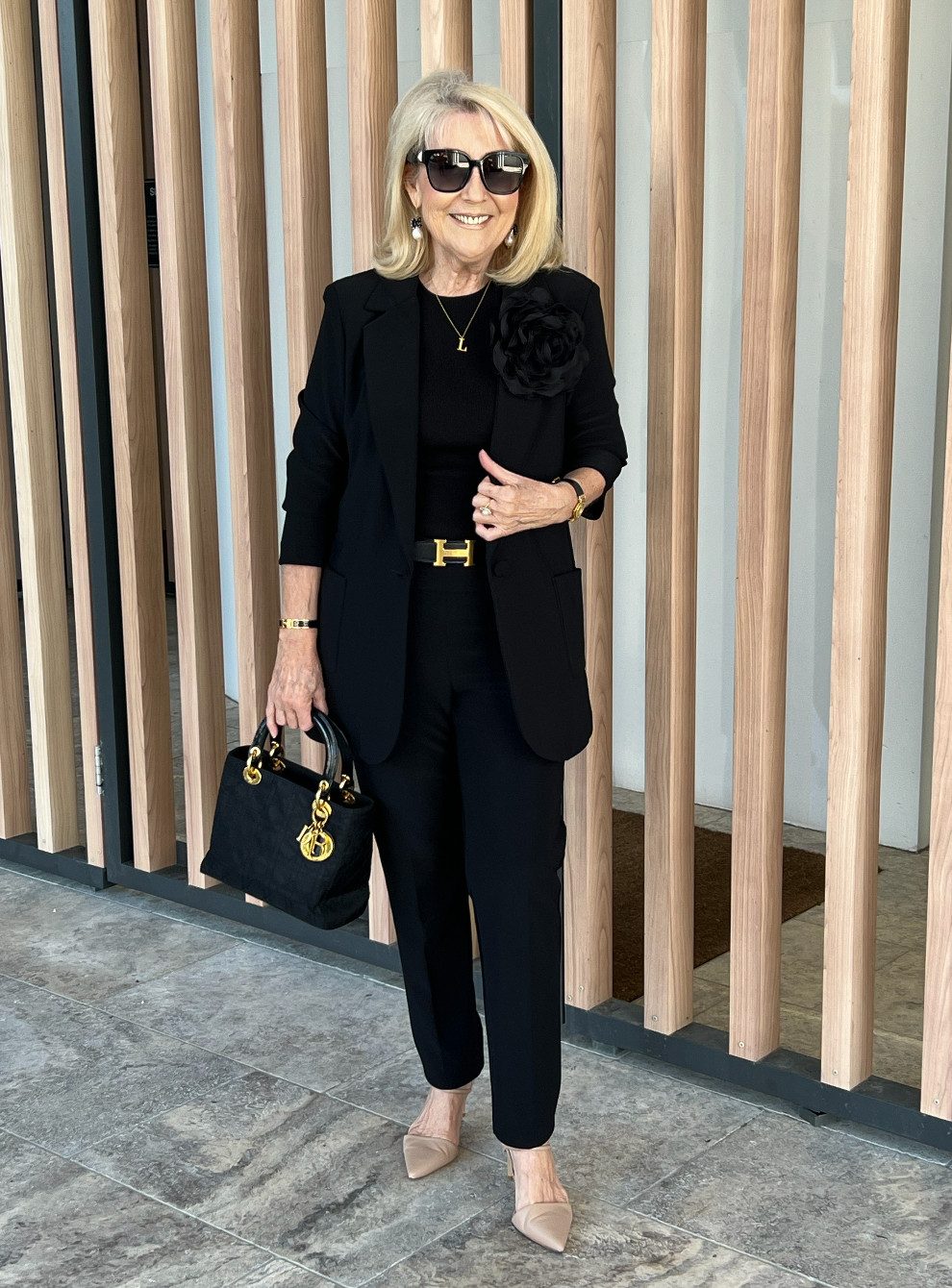You can't look past a classic black suit, the definition of elegance. I have paired this with a vintage Hermes belt and a Dior Bag. 

The suit is from Joseph Ribkoff, and while it is no longer available, I have tagged a similar alternate. A long oversized blazer and straight leg trousers.  

 #LTKaustralia #LTKworkwear #LTKover50style