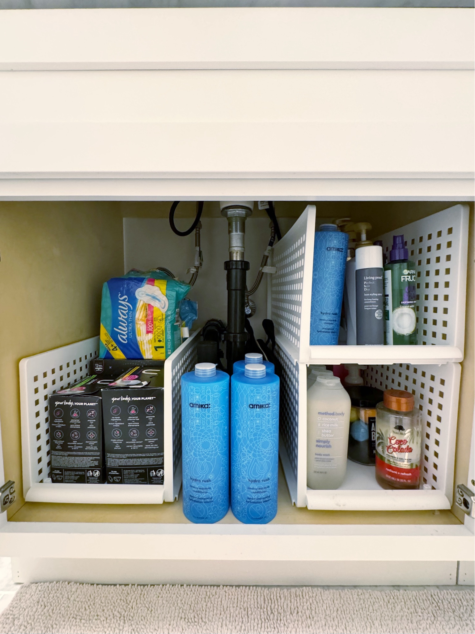 Don’t worry about the undersink pipe, hoses or valves. Use these stacking modular organizers to create order! This is just one option...

#LTKHome #LTKFamily #LTKBeauty