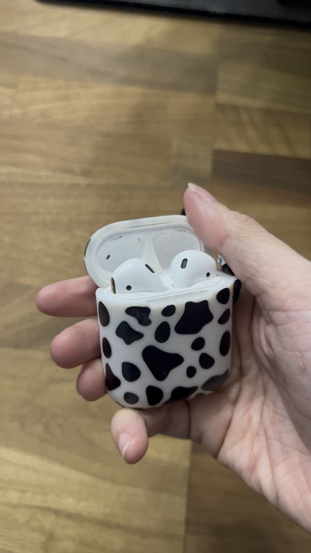 How cute is this cow print silicone AirPod case?! I love how convenient the attached clip is and durable the cover is 

Tech accessories, headphones, earbuds 

#LTKfindsunder100 #LTKhome #LTKtravel