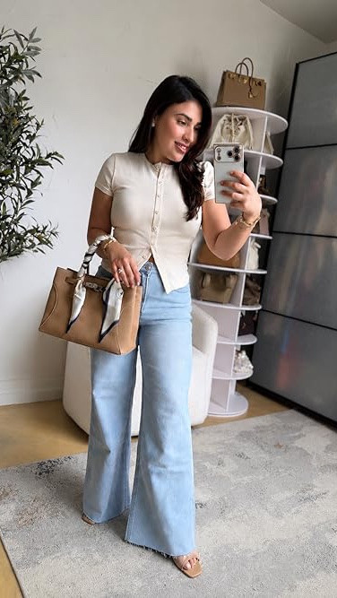 The fitted little basic top that instantly makes every outfit feel more put together 🤍

It’s one of those closet staples you’ll reach for over and over because it works with everything. Pair it with jeans for an easy casual look, palazzo pants for a polished work outfit, or dress it up for dinner or a night out.

Wearing top M, jeans 27 and cut to my own length, palazzo pants M.

Linked everything here ✨

#LTKStyle #LTKFashion #EverydayStyle #ClosetStaples #PetiteStyle