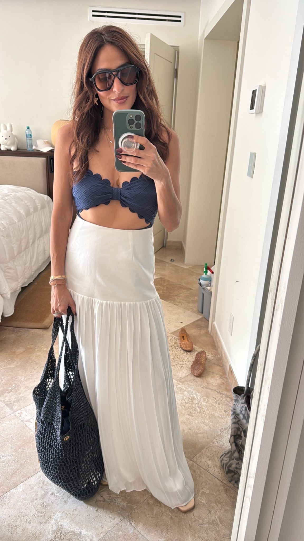 One piece that works like a 2 piece with a maxi skirt. Size small and skirt set is size small. Comes with a white crop 



#LTKTravel #LTKFindsUnder50 #LTKOver40