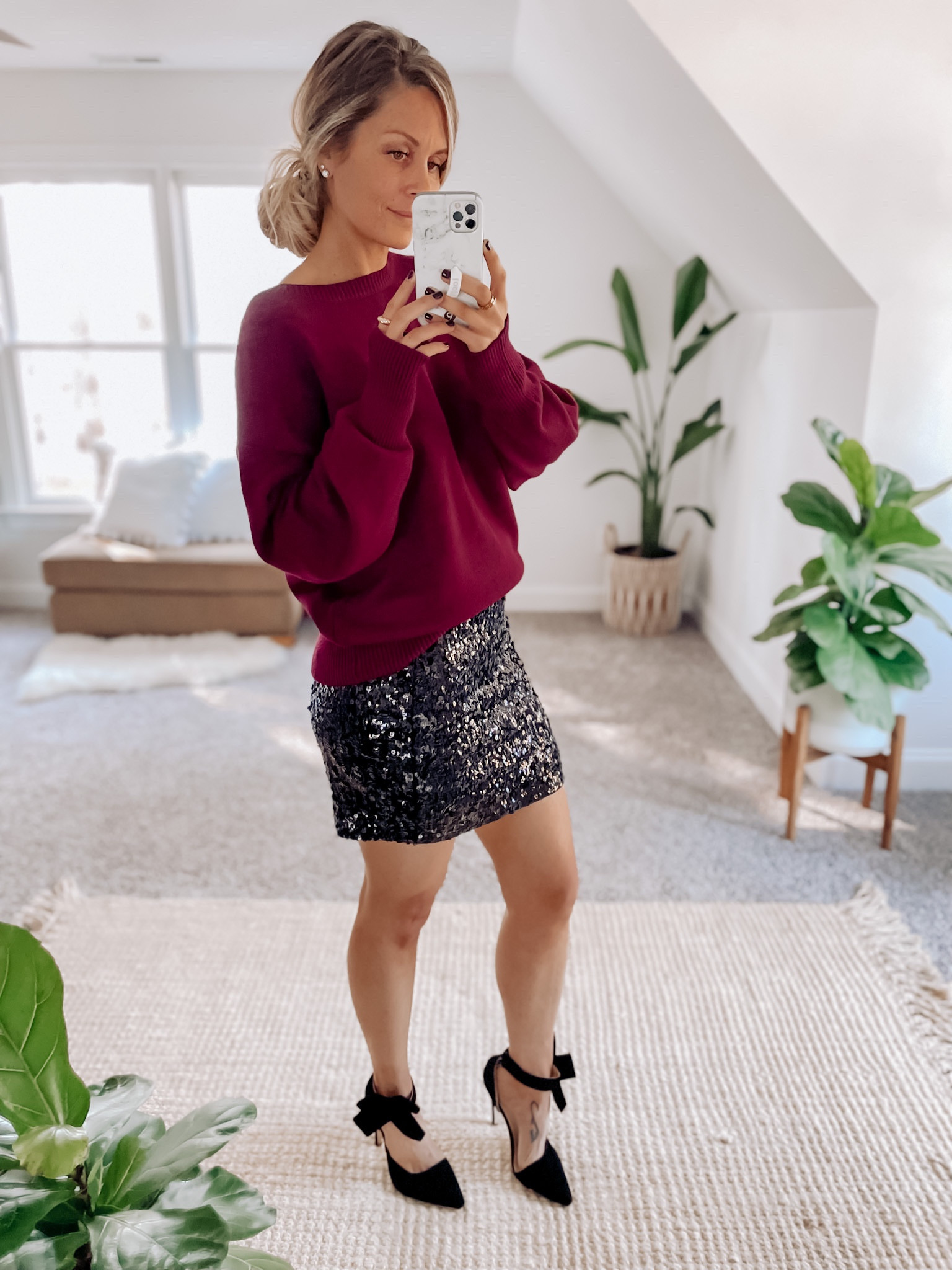 Nothing says HOLIDAYS like sequins and bows!! I LOVE this sequin skirt!! It fits true to size, pull on and very stretchy. It is so soft on the inside you don’t even notice the sequins on the outside. Paired with these cute bow heels makes the perfect statement for any holiday Christmas party. 

Tags: holiday outfit - holiday fashion - black bow heels - dressy Christmas outfit - Christmas party outfit - Christmas party fashion - cute Christmas outfit - holiday skirt sequin mini skirt - oversized sweater - bow tie backless sweater - backless sweater - maroon sweater 

#LTKGiftGuide #LTKHoliday #LTKSeasonal