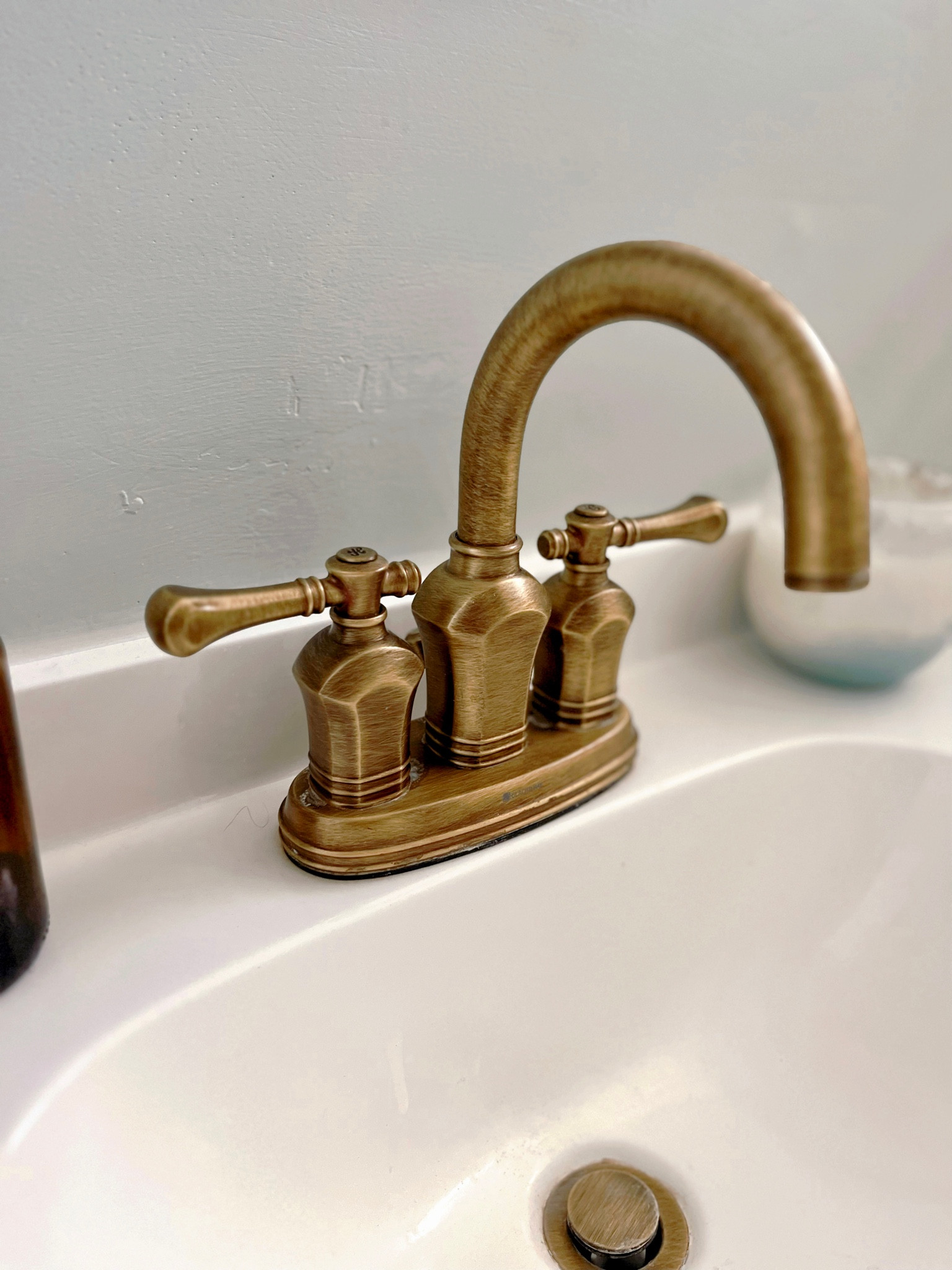 Antique brass finish on new bathroom vanity faucet

#bathroomreno #brassfaucet #californiahome #bohodecor

#LTKfamily #LTKFind #LTKhome