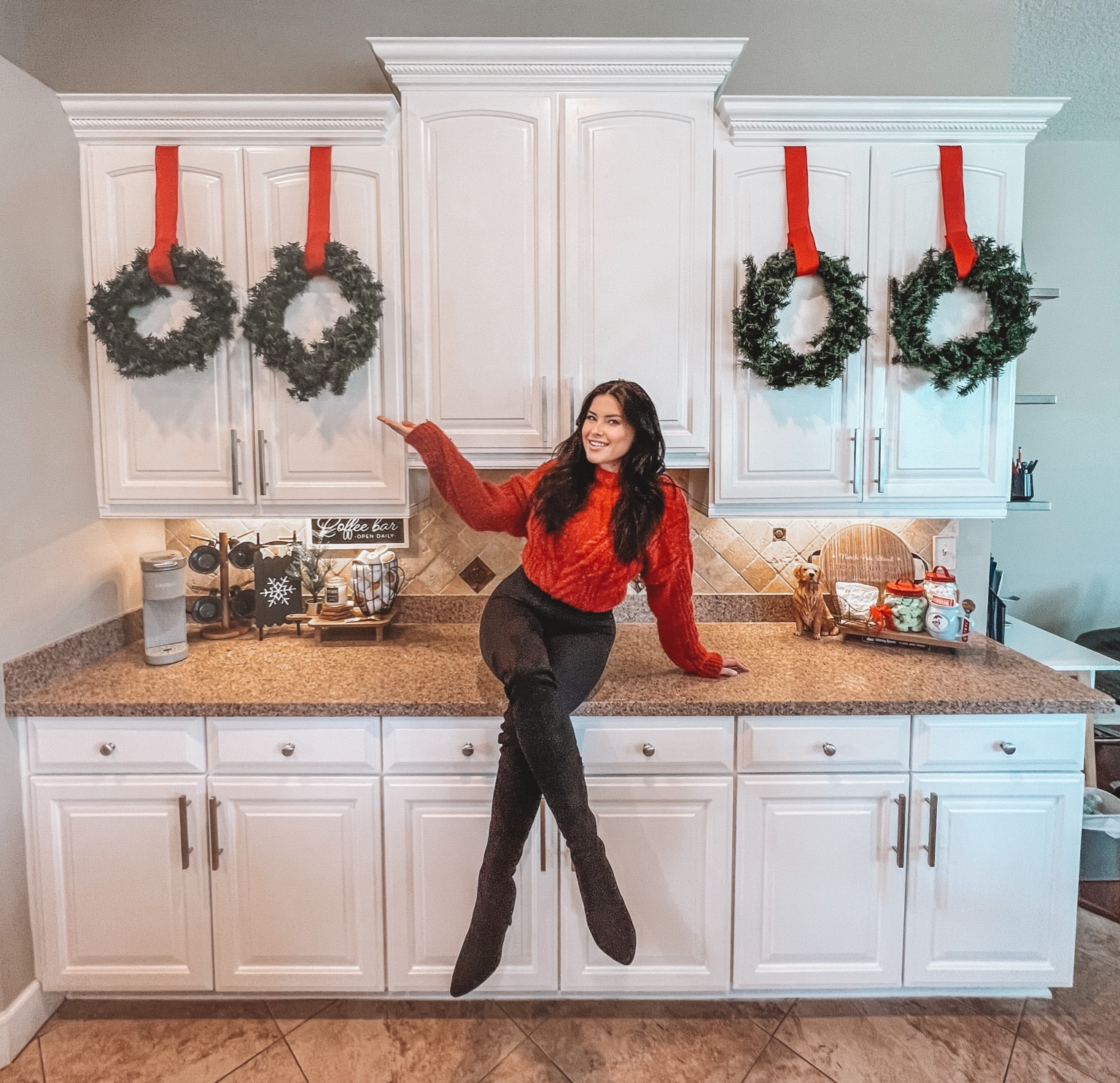 🎄Would you add this to your kitchen??

Decorations around the house are busting out!! This simple yet classic decor is super easy to recreate and looks so classy in the kitchen!

I just found out we are hosting Christmas dinner at our house for 12😳 I’ve never hosted but I’m determined to make it a magical and yummy experience for our Georgia and Florida family!!!

Tis the season♥️

How to: 
4 16” red ribbons with a hole on top
2lb command strips to hold the hanging wreath on the inside of cupboard 
Hot glue gun to glue the ribbon around the wreath 

& voila! You have a beautiful out of the magazine Christmas decor in your kitchen— all you need are the gingerbread cookies and guests😉🎄🎅🏽

#LTKSeasonal #LTKHoliday #LTKhome