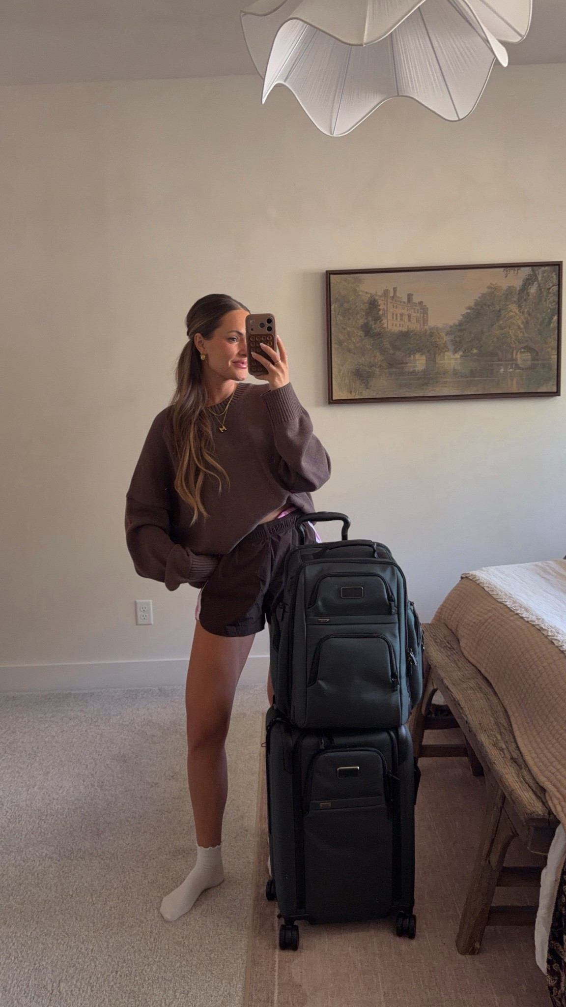 Travel outfit! I’m wearing size XL in the quince sweater for a bigger fit! The shorts are old but I linked super similar!

#LTKootd #LTKTravel