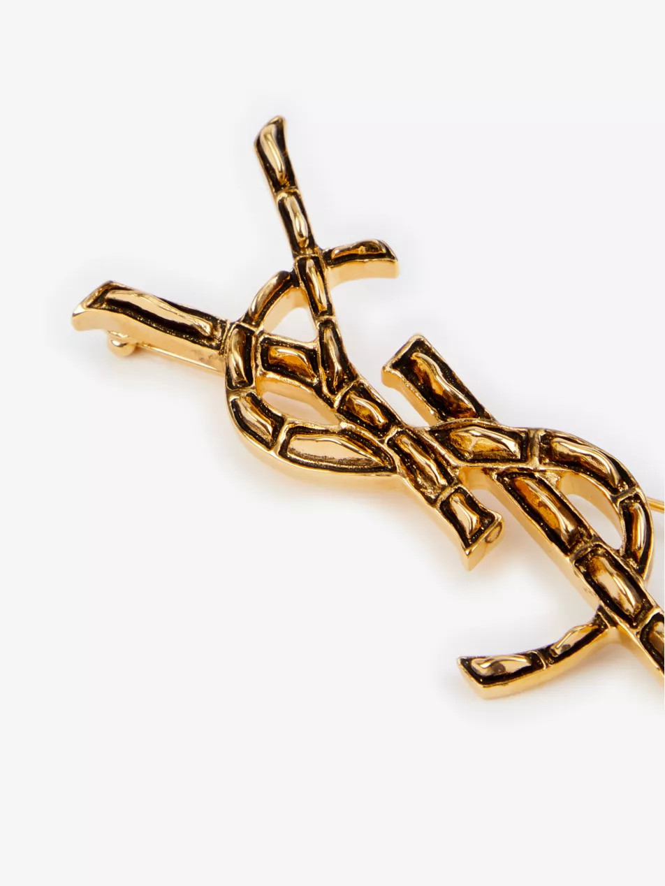 Opyum monogram brass brooch | Selfridges
