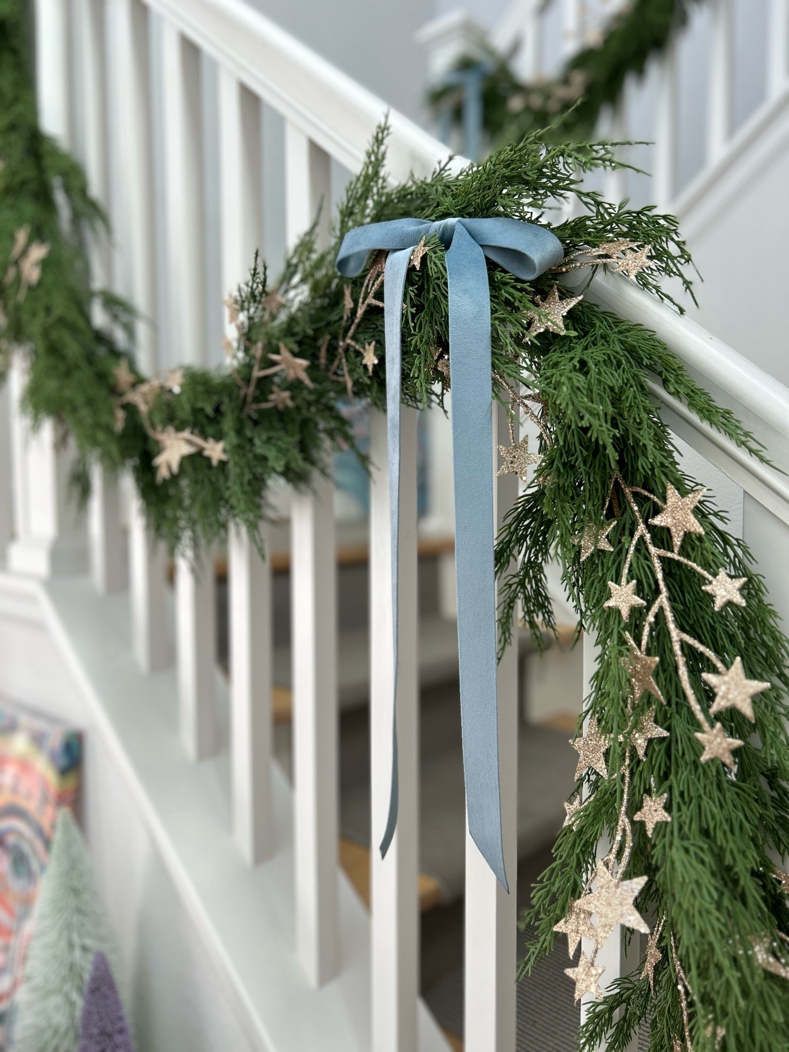 The most beautiful double sided velvet ribbon! I love this dusty blue but they also have other beautiful color options #LTKhome this garland was found at TJ Maxx but I liked a similar option that is stunning in person. Linked is a Velcro strap which is how I attached the garland to my railing without causing damage to the paint. 

#LTKHome #LTKSeasonal #LTKHoliday