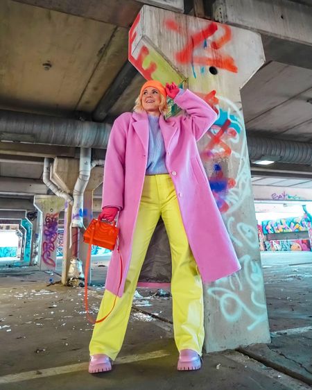 Pastel style street wear look! Long pink coat mixed with yellow, lilac and orange. 