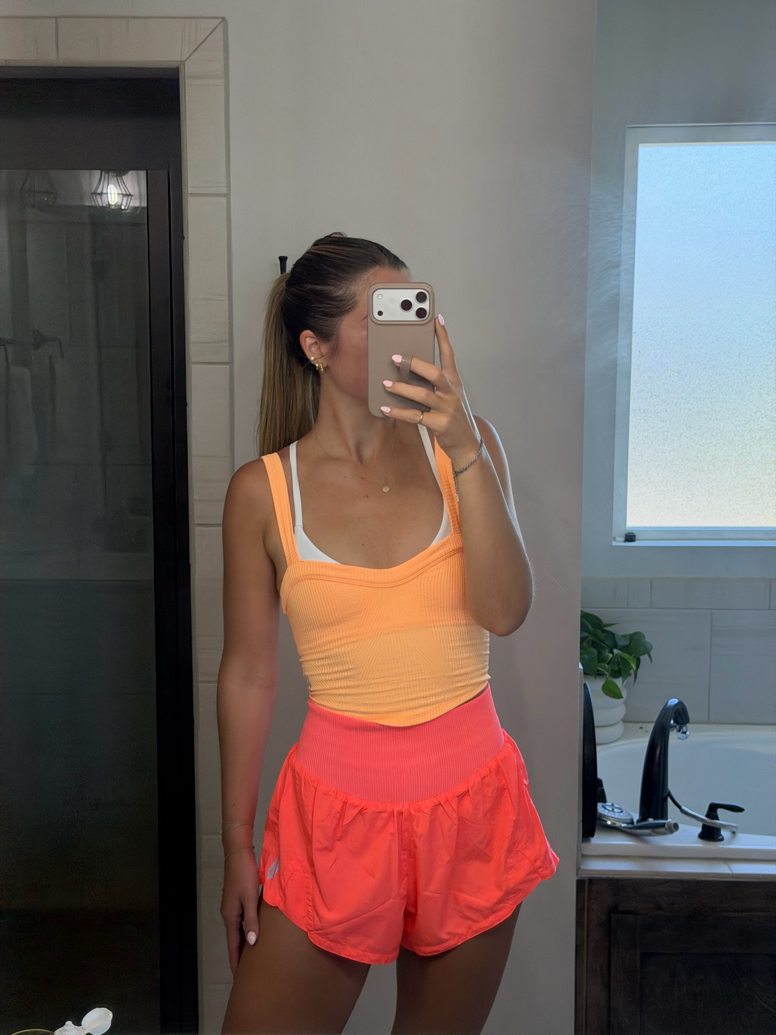 size small in shorts (color is neons coral) , small in bra (color is white) and s/xs in tank top (color is clementine)

#LTKfitnessgoals #LTKootd #LTKActive