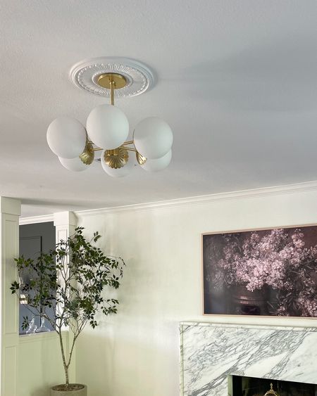 Our living room modern globe gold light fixture is on sale for 25% off! Love this paired with this ceiling medallion!

#LTKhome #LTKsalealert #LTKstyletip