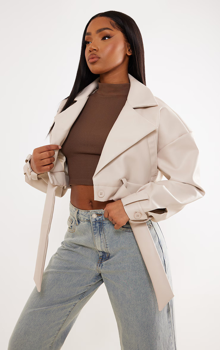Stone Oversized Belted Hem Cropped Biker Jacket | PrettyLittleThing US