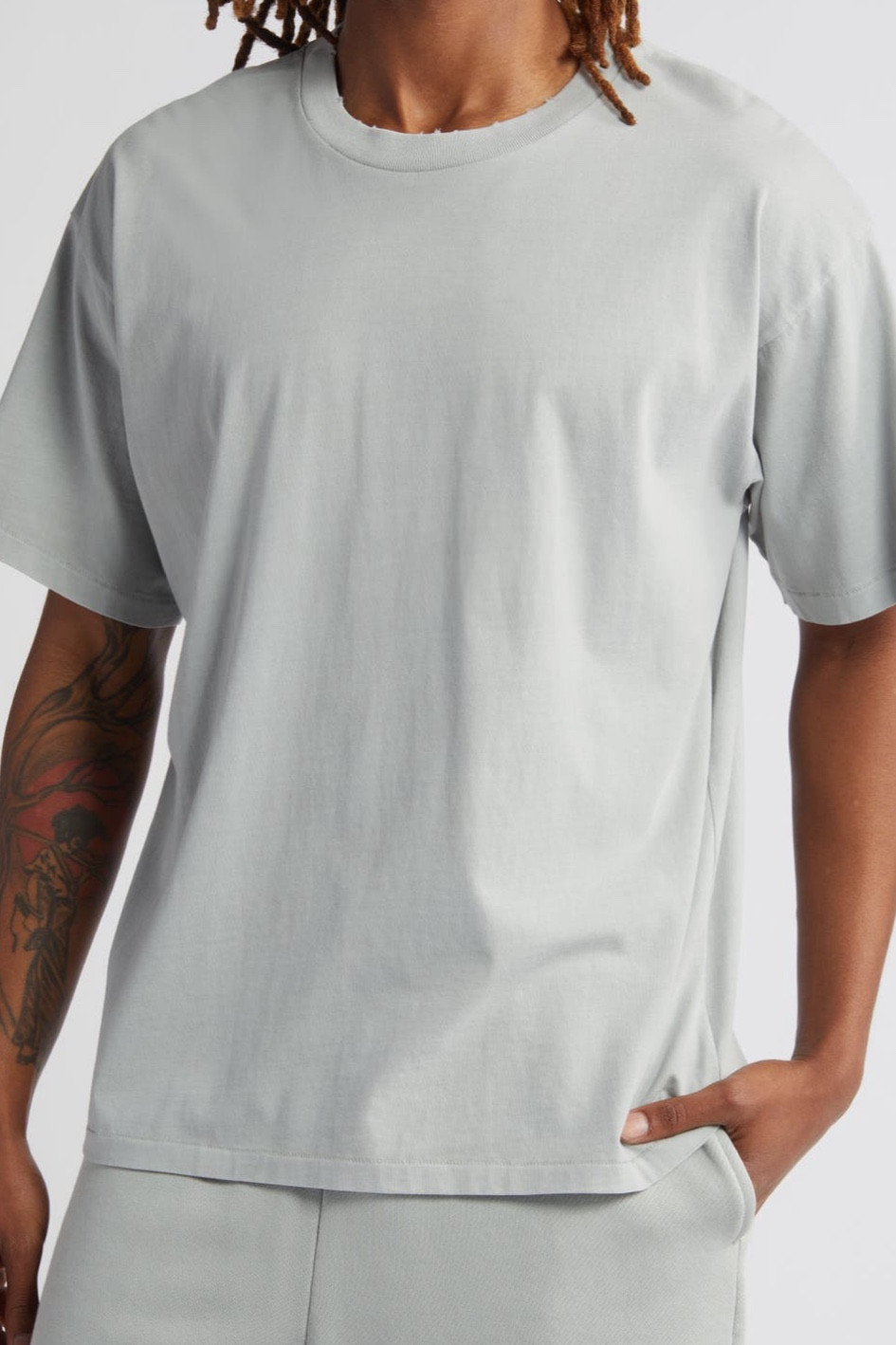 Oversized tee, super good quality! Love this brand ! Love how it sits on my husband 