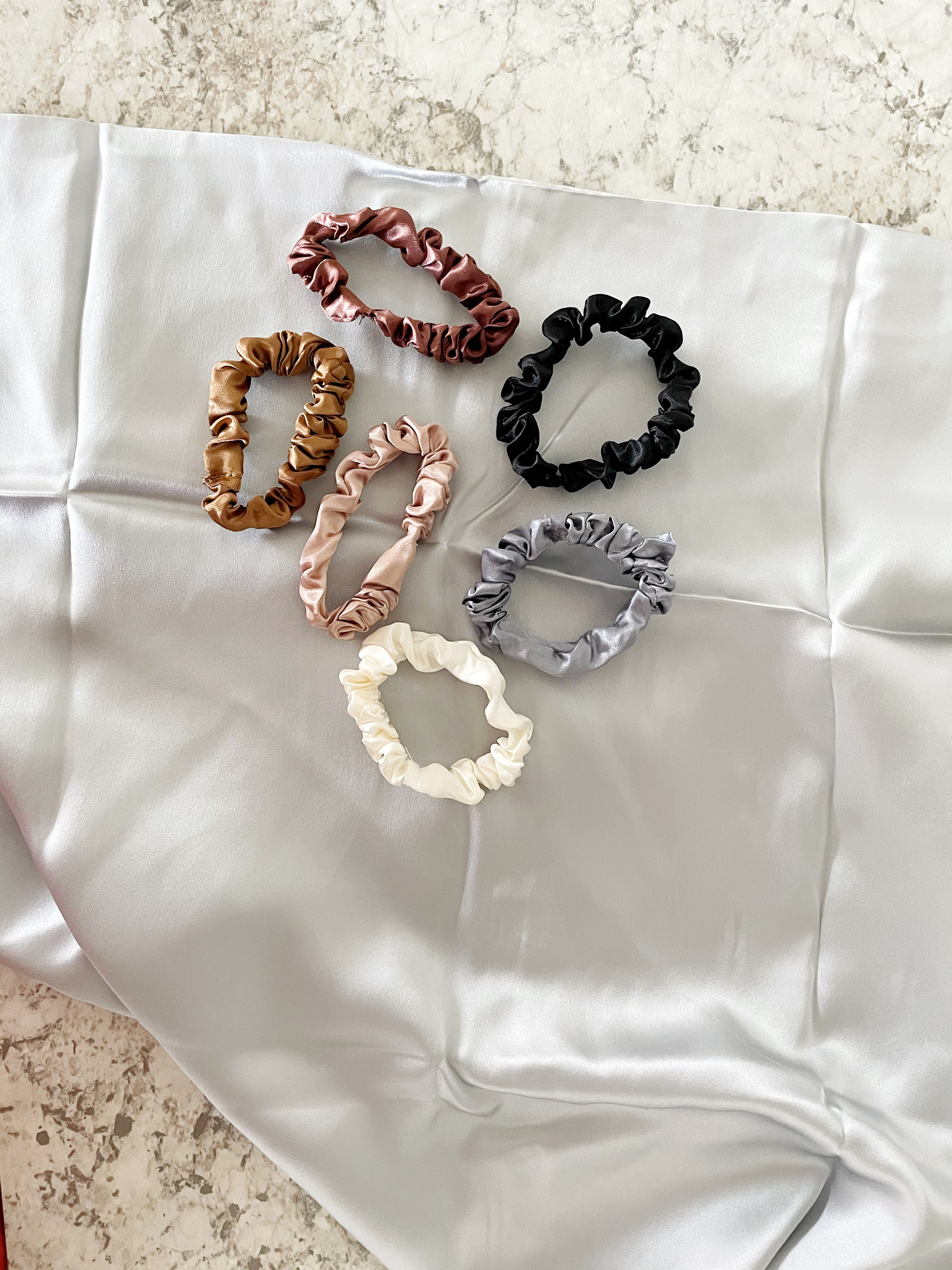 When I put my hair in a ponytail or a bun, I use a satin scrunchie. They are gentle on my hair because they glide off the hair vs. snag. These are the two sets that I've purchased over the years.
#LTKhair #hairproducts #haircare #relaxedhair 

 

#LTKBeauty