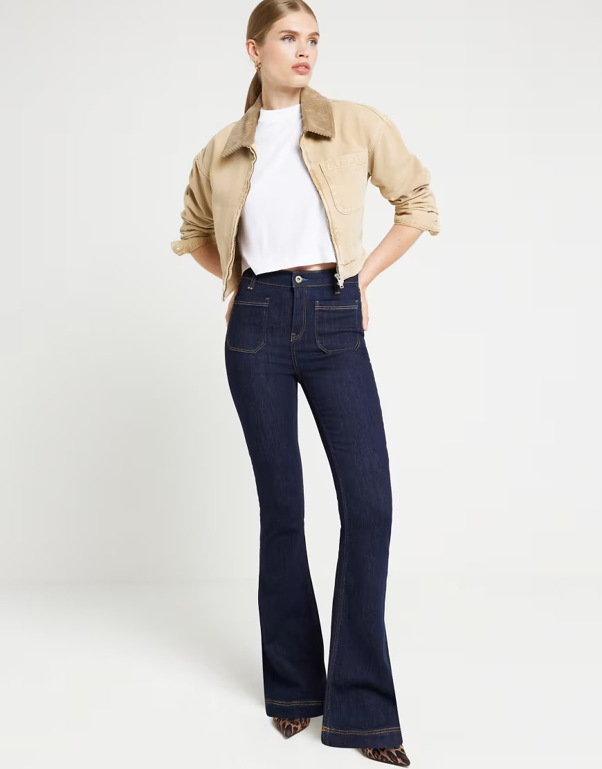 River Island flared jeans in dark wash blue | ASOS (Global)