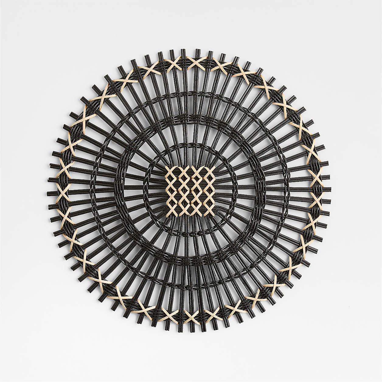 Amira Black Radial Rattan Placemat + Reviews | Crate & Barrel | Crate & Barrel