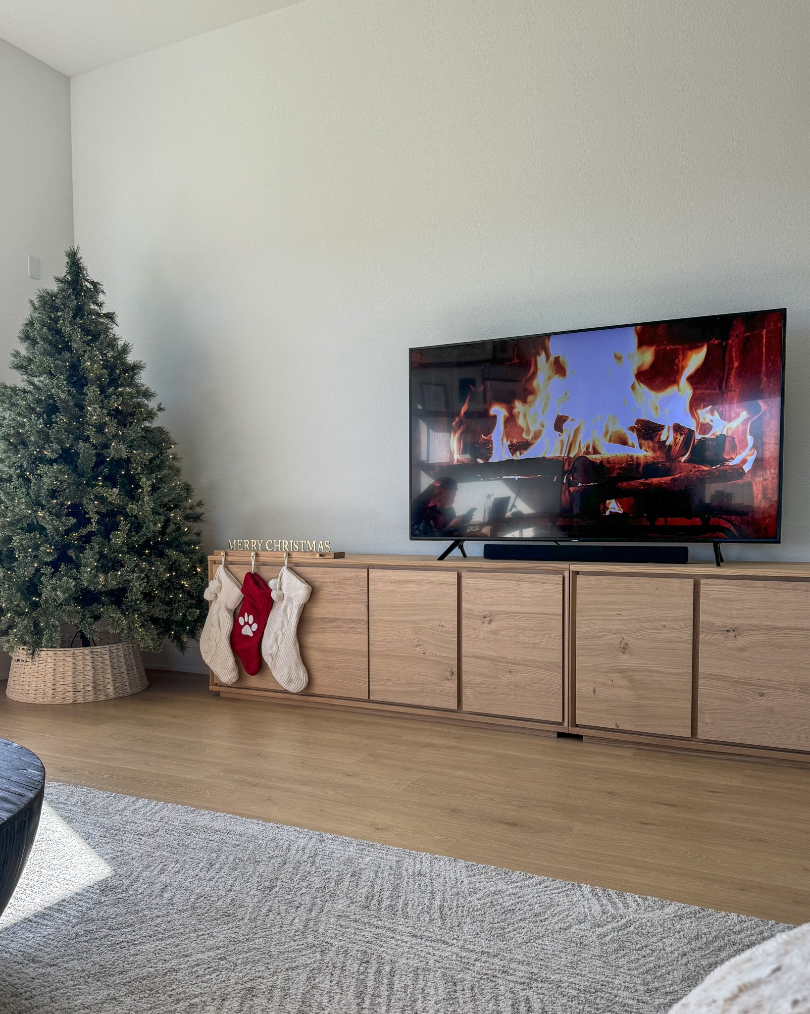 double white oak media consoles for lots of extra storage in our living room! these cabinets are so spacious, have built in handles, soft close hinges, come with adjustable interior shelves, and are a beautiful blonde wood finish for a sleek and modern look!

#LTKHoliday