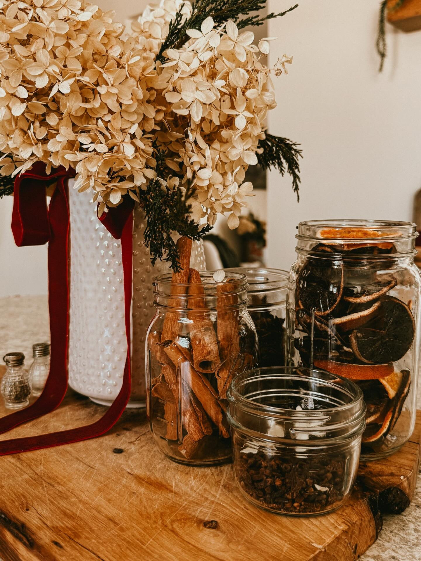 Christmas is settling into our little cottage and most of what you see has been loved for years. A few pieces were thrifted, a few were handmade, and some came from boxes we’ve opened every December since the kids were small.

Nothing here is Pinterest perfect and that’s exactly why I love it.

It’s mismatched garlands, ornaments with stories, greenery clipped from the yard, candles from last year, and the kind of cozy that comes from using what you already have. I think homes feel more magical when they’re filled with memories instead of brand-new everything.

You don’t need a picture-perfect house to make a beautiful Christmas.
You just need warmth, intention, and the people you love inside it.

Here’s to simple holidays that feel like home. 🎄✨