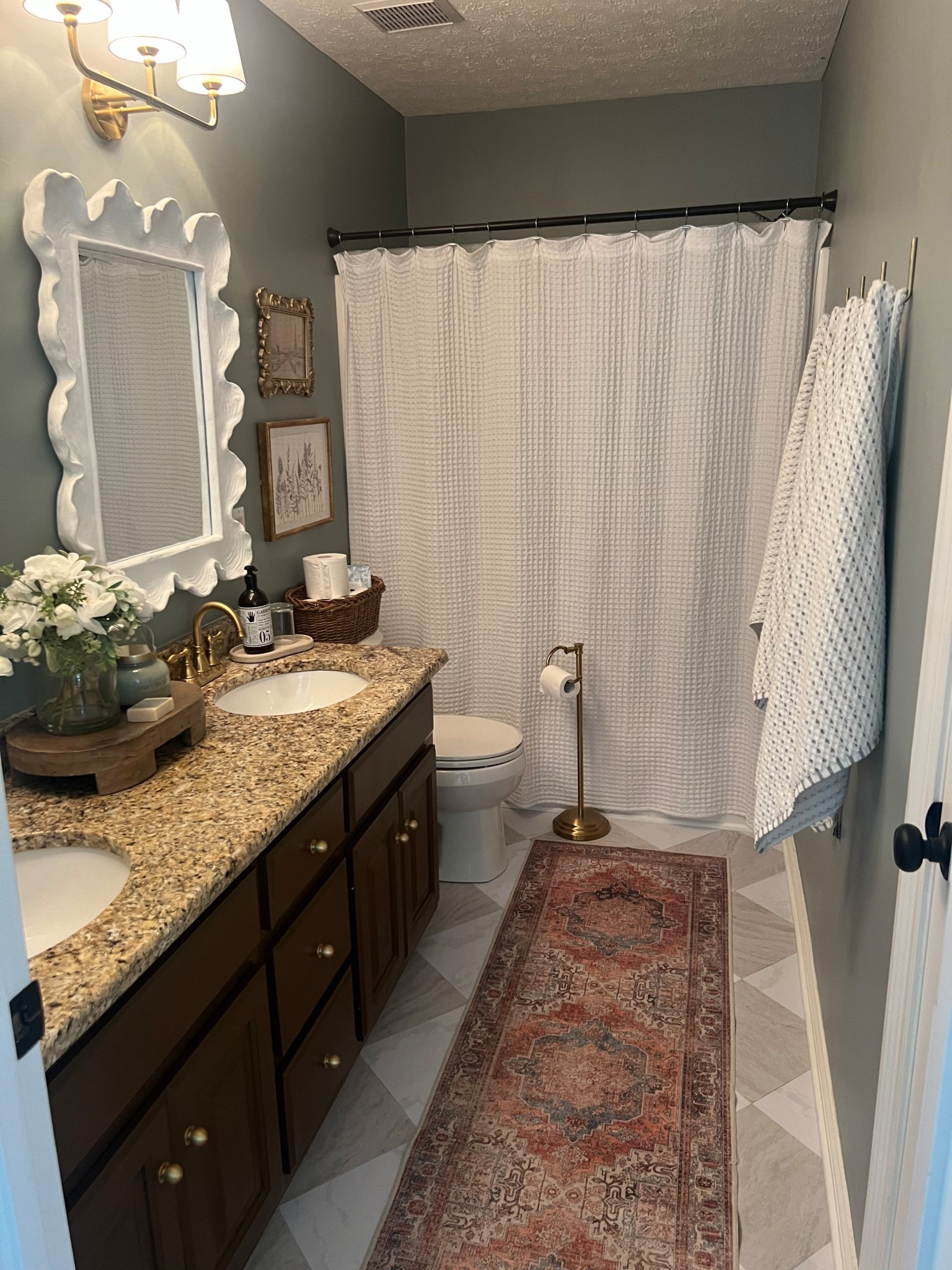 #LTKbathroom #bathroom 
Cabinet color: SW Muted Mahogony 
Wall color: Behr Sage Grey