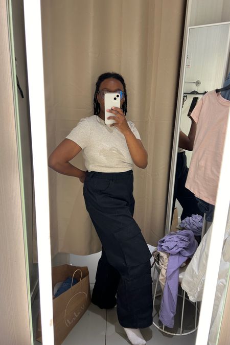 check out these pockets on these black cargo pants from H&M!!! had to stand weird so yall could see em cause the fitting room can be dark 👀👀 but i loved these. grabbed a size too big so im holding them up! get em asap

#LTKstyletip #LTKsalealert #LTKmidsize