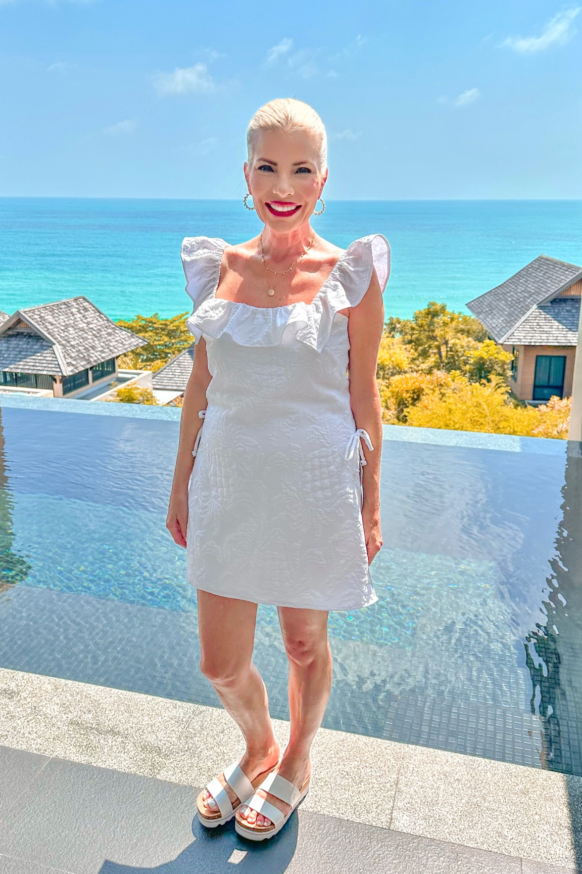 I love this romper from Lilly Pulitzer. 🫶🏻The stretchy white on white fabric detail and ruffles are beautiful! This look is really comfy and easy to wear because of the skort aspect. (Runs tts. I’m wearing a size 4) My sandals are one of the most comfortable shoes I own. They’re from reef, come in several colors and made for walking. ☀️ 

#LTKshoecrush