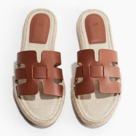 Brown espadrille slide sandals 

#LTKfindsunder50 #LTKstyletip #LTKshoecrush