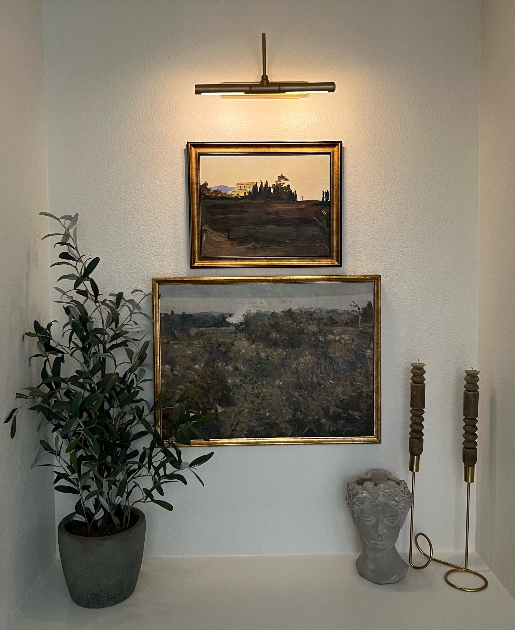 The exact candles, bust and frame for the artwork at the top are linked. Other items are sold out but I linked similar! The picture light is SO easy to install and it’s battery operated, so no hardwiring needed!! I used the tagged rub n buff to get the gold I wanted! 

Amazon home, home decor, picture light, battery operated picture light, affordable home decor, target home, Grecian bust, rub n huff 

#LTKhome