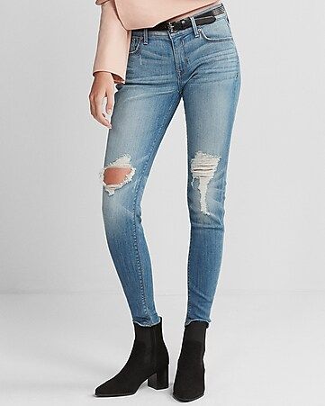 Mid Rise Medium Wash Distressed Stretch Jean Leggings | Express