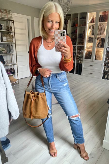My favorite fall purse is back in stock!!!! Entire outfit is @amazon
Jeans size 6
Tank small
Shrug medium 

#LTKitbag #LTKfindsunder50 #LTKSeasonal