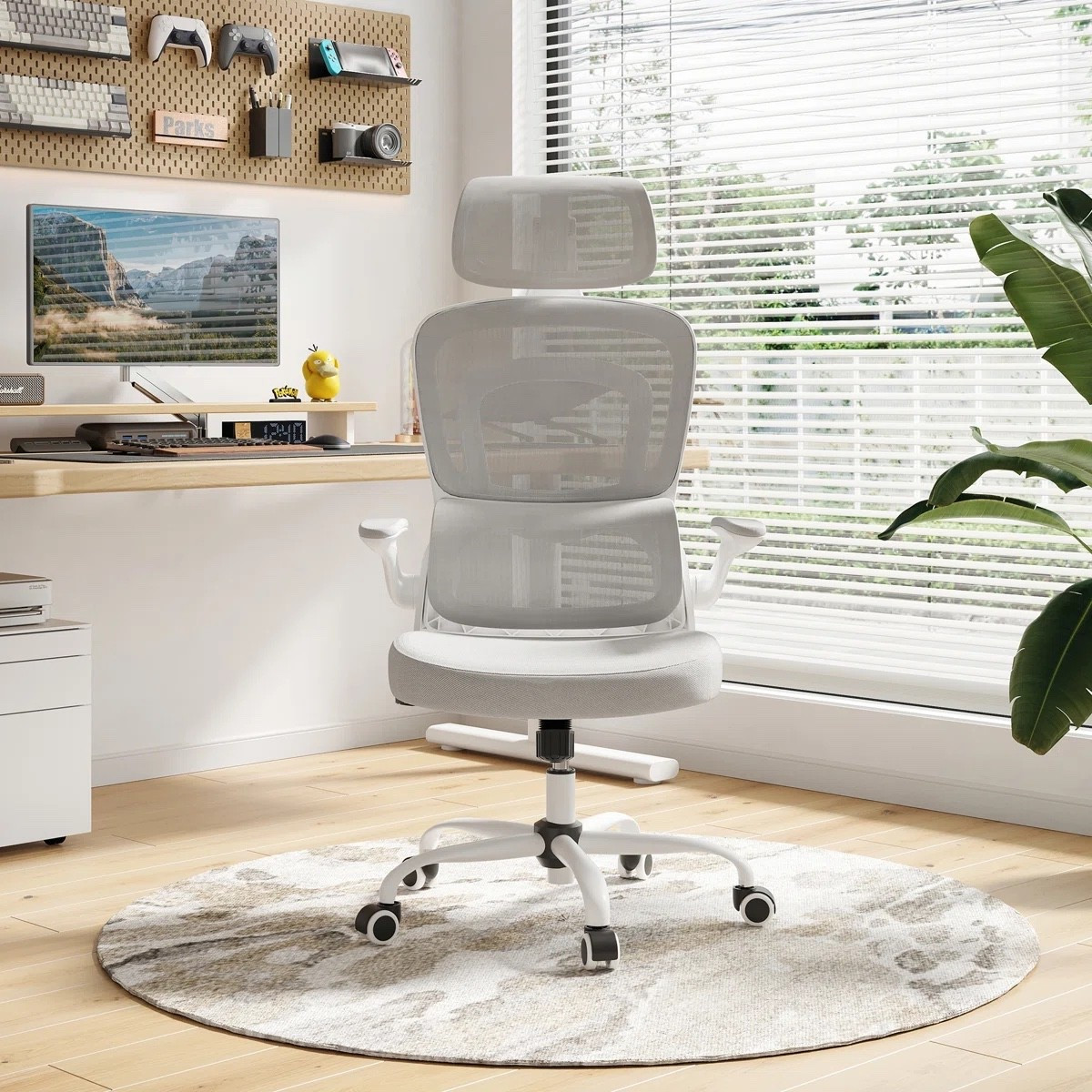 This modern ergonomic office chair is such a clean upgrade for a home office or WFH setup. The breathable mesh back, adjustable headrest, and sleek white frame make it comfortable and visually light — perfect for small spaces or minimalist offices.
I’ve tagged the exact chair shown, plus similar ergonomic desk chairs, office rugs, and workspace decor to recreate this look.
