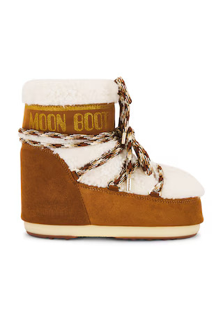 MOON BOOT Icon Low Shearling Boot in Whiskey & Off White from Revolve.com | Revolve Clothing (Global)