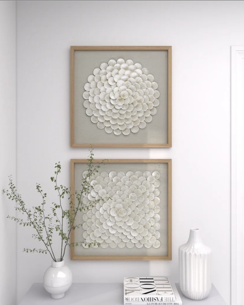 Two piece cream handmade shell shadow box art

This art is beautiful and unique. Perfect for a bathroom, main bedroom or living room. Currently on sale for Labor Day  

#LTKParties #LTKU #LTKSaleAlert