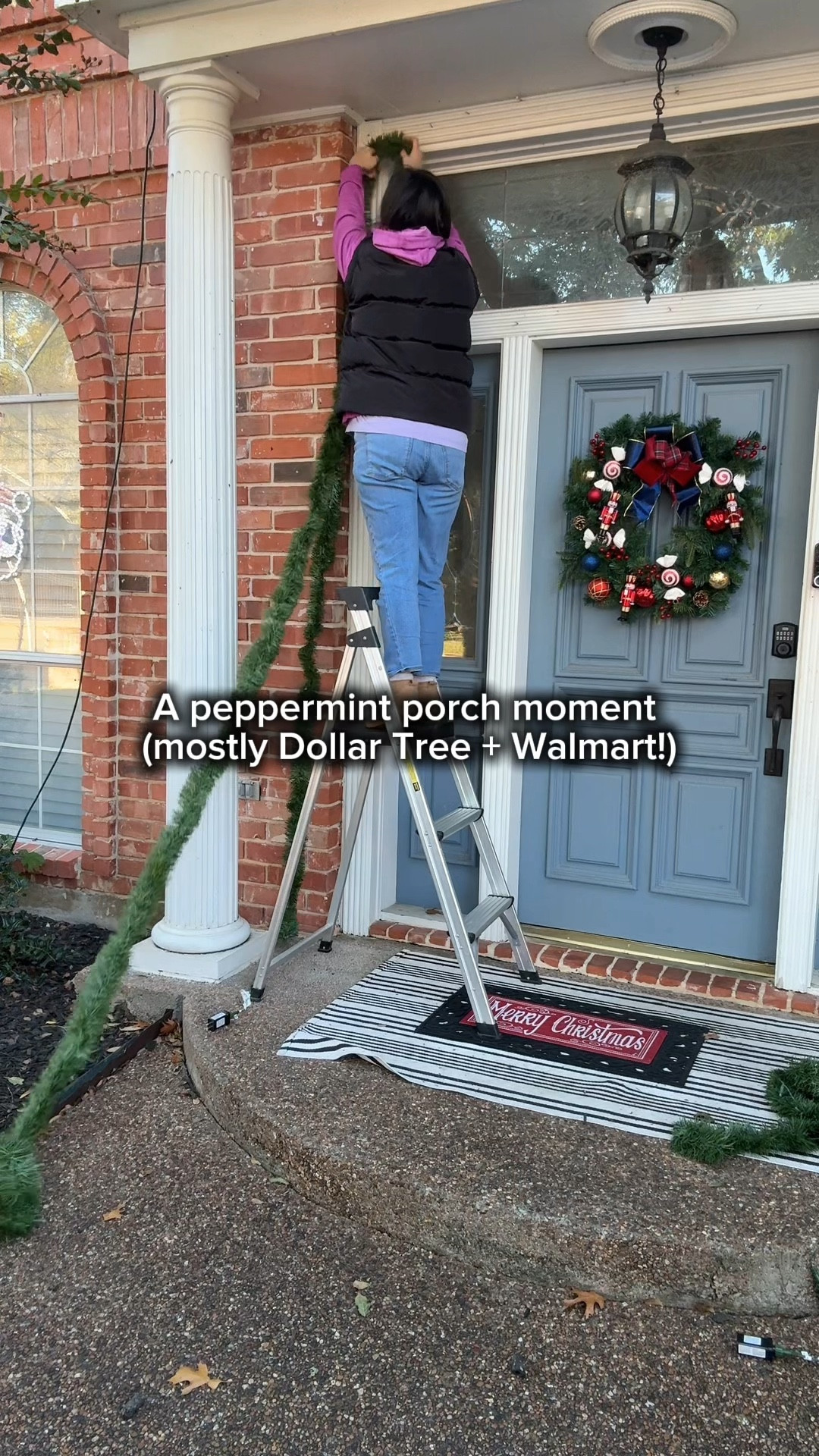 Decorate the porch with me! I wanted a simple but magical red and white peppermint theme this year, and it all came together with a mix of Walmart basics, Dollar Tree finds, and a few things I already had on hand.

I started with two strands of the 25-ft pre-lit rope garland from Walmart to wrap around the doorframe. Using two gives you a slightly fuller look and creates a sturdy base for any lighter tinsel decorations. Across the top, I added a pre-lit garland from my holiday stash for extra glow.

Dollar Tree came through with the cutest red and white tinsel pieces—candy canes, ornaments, and those little nutcrackers that were not $1.25 (they were $7 each), but they matched my Home Depot wreath perfectly, so I couldn’t resist. I used small cable ties to secure everything evenly around the garland.

To finish the look, I flanked the doorway with two small pre-lit trees and added any red and white ornaments I could find from our collection. For the layered rug moment, I kept the black and white base rug we already owned, added a smaller red and green plaid rug from Target, and topped it with my SwitchMat and a Merry Christmas insert.

It looks so cute day or night, and it turned out almost exactly how I pictured it.

Save this for porch inspo and follow @makingfrugalfun for more frugal holiday decorating ideas, DIYs, and home projects all season long.

#christmasdecor #holidaydecor #porchdecor #decoratewithme #budgetdecor #frugalhome #frugalliving #dollartreedecor #walmartfinds #christmasporch #holidayhome #beforeandafter #christmasideas

#LTKHome #LTKSeasonal #LTKHoliday