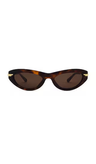Bottega Veneta Oval Sunglasses in Brown. | Revolve Clothing (Global)