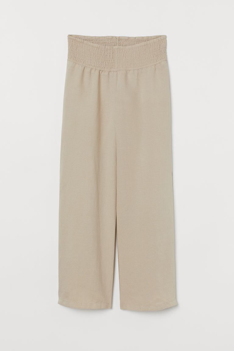 Pants in woven fabric made from a viscose and linen blend. Wide smocking at waist and straight, w... | H&M (US + CA)