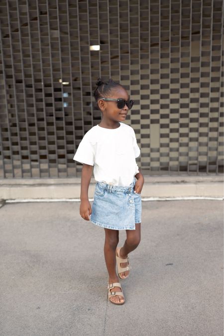 Toddler girl causal summer outfit: dad sandals, skirt, white tee, black sunglasses 

#LTKkids #LTKfamily #LTKshoecrush