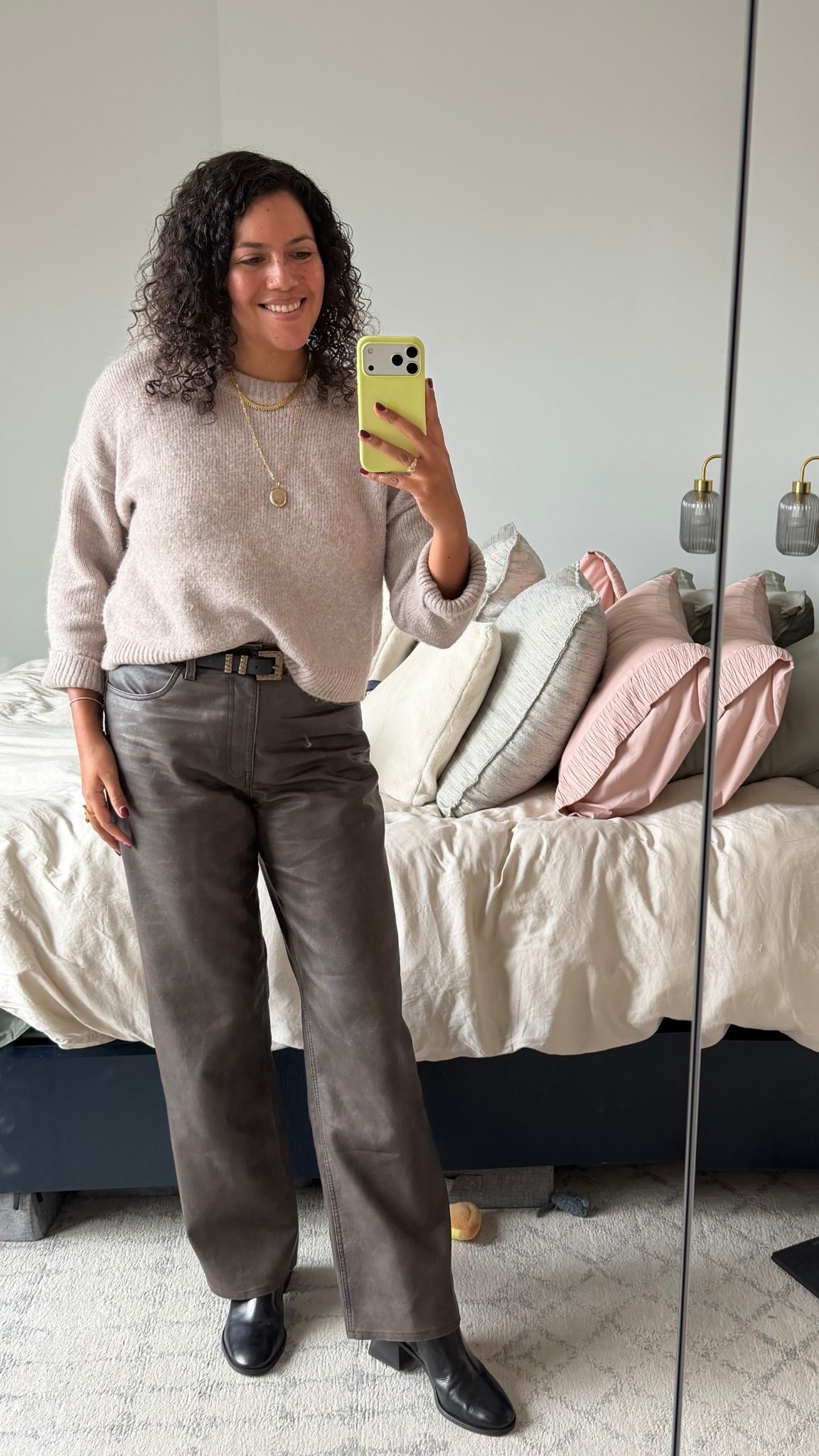 Casual and cozy office outfit! Dark brown faux leather pants (size 31L, run small) and a super soft taupe crewneck sweater (size medium, runs TTSA), both by Abercrombie. I layered a white tee underneath the sweater to break up the neckline when I move, rolled up the sleeves, and added low block heel boots by Tory Burch. 

#LTKWorkwear #LTKTall #LTKMidsize
