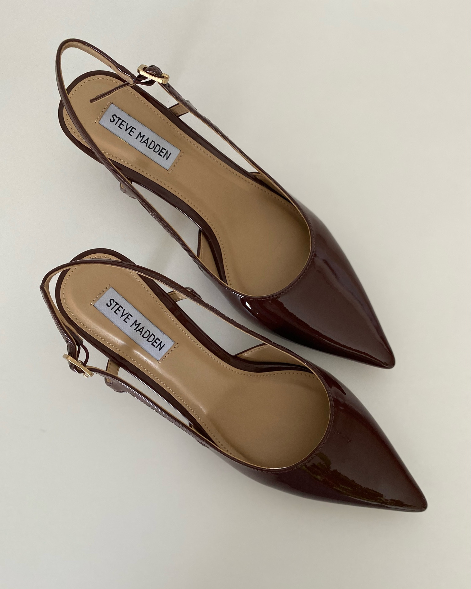 Brown patent leather heels. Brown pumps for fall. Fall shoes. Fall outfit. Steve Madden Legaci Pump. Fits tts and super comfortable heel height. Kitten heel. 

#LTKShoeCrush #LTKFindsUnder100 #LTKSeasonal