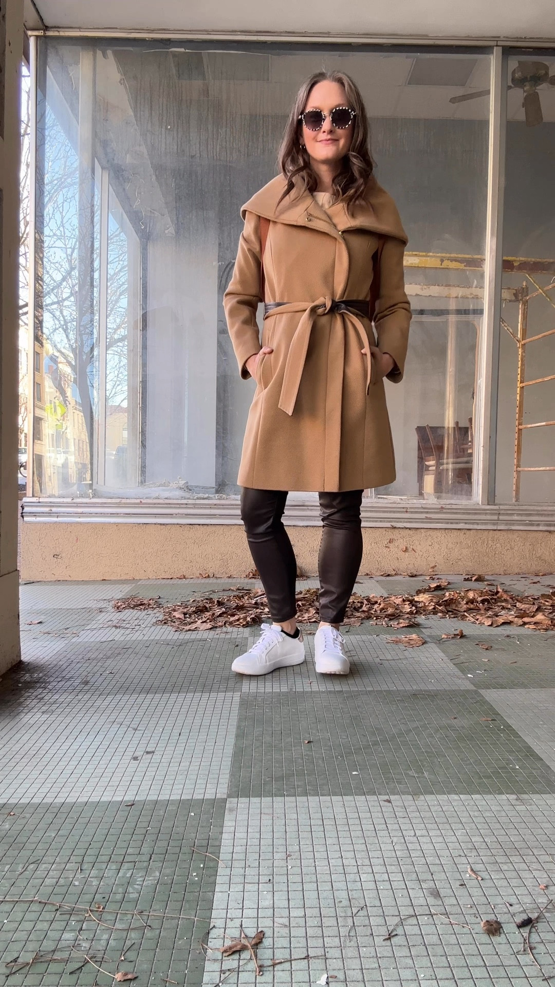 On a freezing Black Friday at her in-laws, she opted for brown waxed pants that felt just edgy enough to take on the chill, paired with a camel and ivory striped boatneck top that peeked out beneath her camel coat—because cute outfits don’t stand a chance without proper layering in this weather. Her new platform sneakers with their subtle gold detail added a pop of modern flair to an otherwise classic look, while her everyday gold hoops and necklace tied it all together with effortless charm. The day started with a nostalgic coffee date with an old friend, filled with laughter and stories that made her heart warm despite the frosty air. Back at the house, her son was delighting in playtime with his cousin, aunt, and uncle, their laughter echoing through the halls—a holiday soundtrack she wished she could bottle and save for later.

#LTKStyleTip #LTKSeasonal #LTKWatchNow