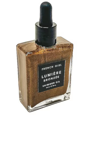 Lumiere Bronze Shimmer Oil | Revolve Clothing (Global)