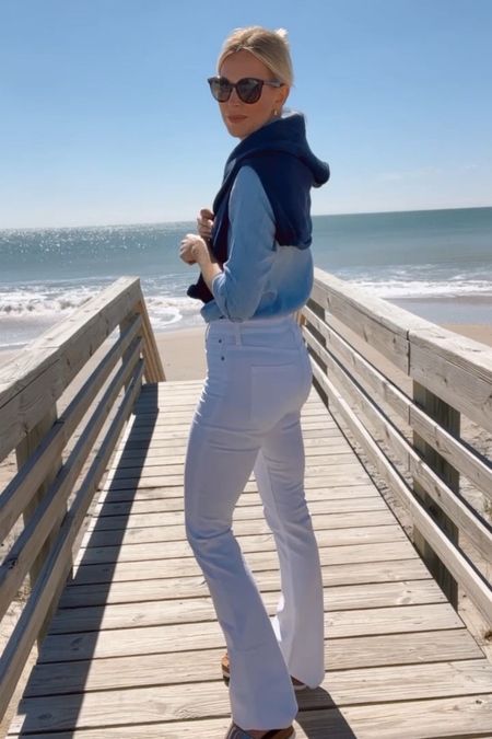 Beach trip outfit for spring & cooler weather. White flare denim, chambray top, beach styles. Wearing a small in the top and a 26 tall in jeans

#LTKSeasonal #LTKstyletip #LTKtravel
