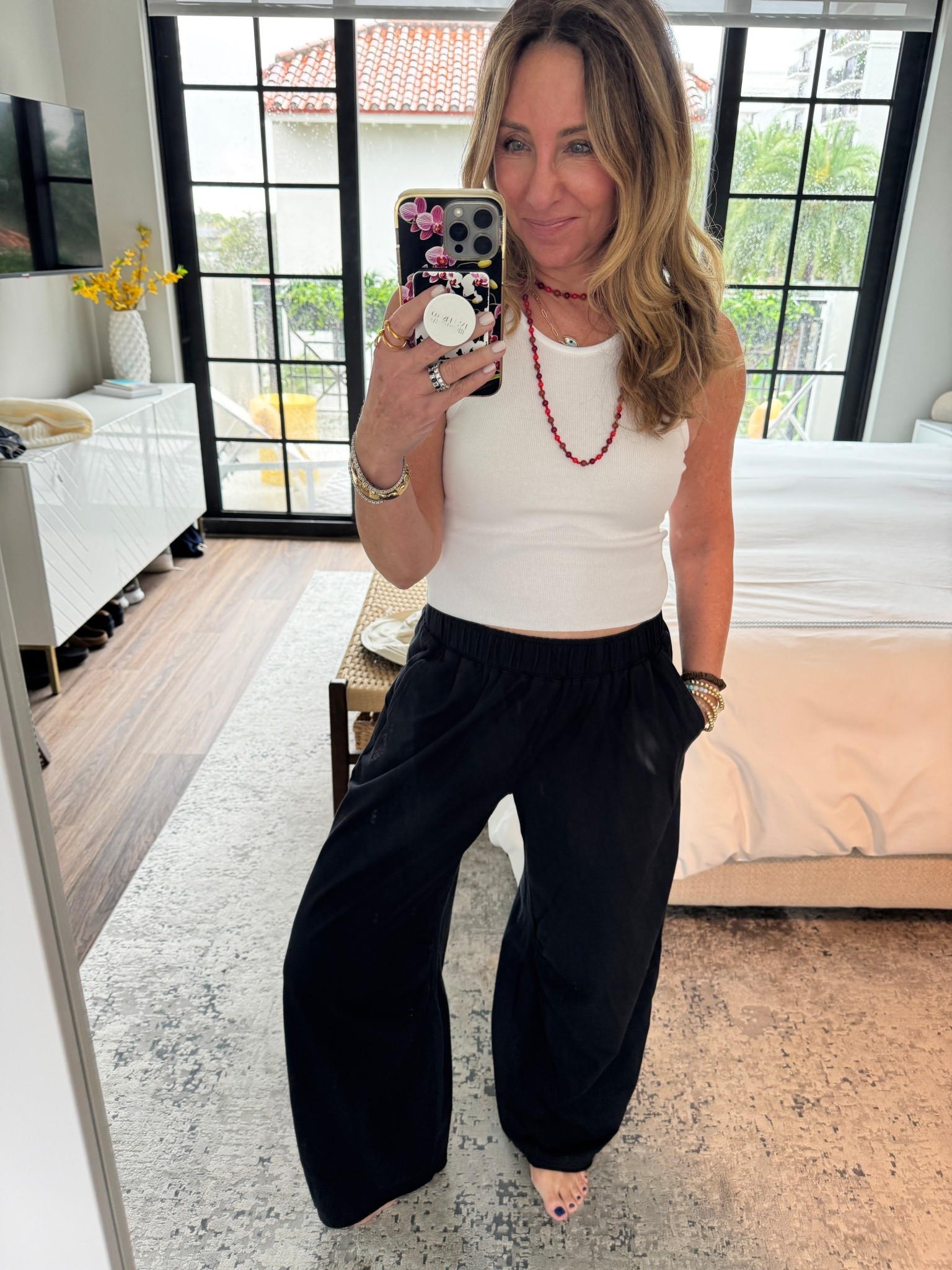 Lounging around the house, and some errands. These pants came as part of a set. I don’t really like them as much with the matching top as I do it with just a plain white tank. They’re basically a barrel pant but sweatpants. And I’ve been wearing this red beaded necklace a lot. It just sort of adds a little touch too casual outfits.

#LTKgrwm #LTKdayinmylife #LTKootd