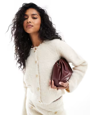 ASOS DESIGN crew neck cardigan in boucle yarn in cream | ASOS (Global)