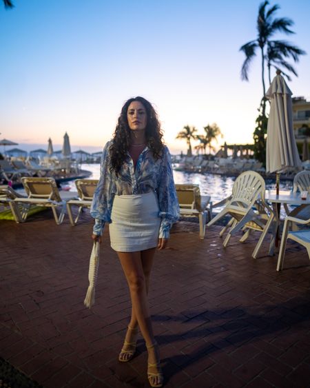 Vacation outfit | linen skirt | flowy top | vacation style | resort wear | blue top | blue blouse | strappy sandals | button down shirt | Mexico outfit | spring outfit | summer outfit