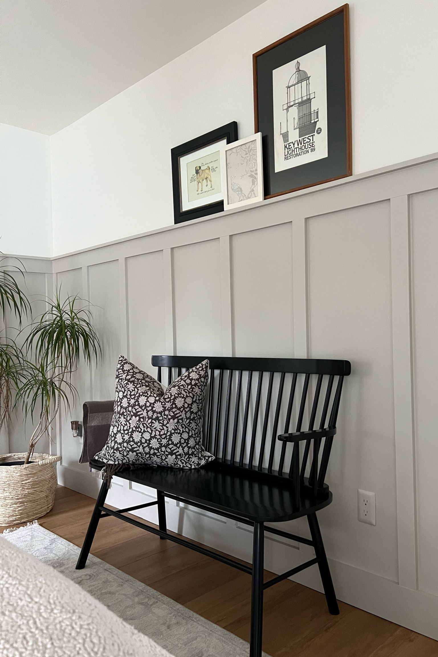 Black bench // brown floral pillow // artwork black frame // entry way 

#LTKhome