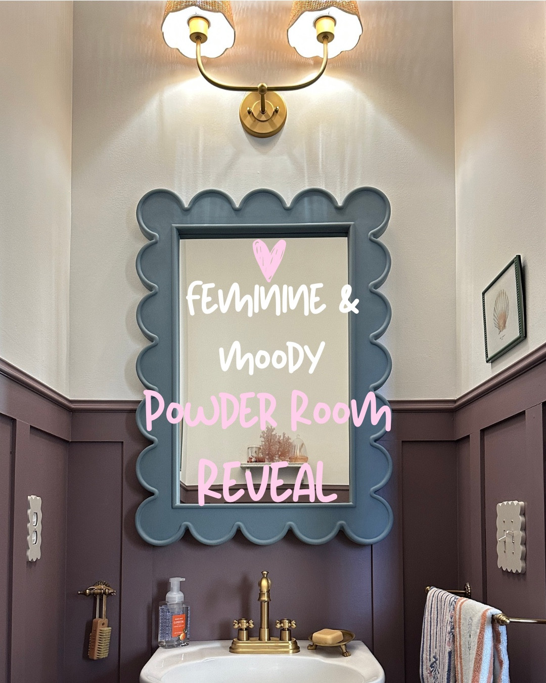 There’s something about a powder room that feels like permission to take a design risk… and I went all in 🤎

Moody mauve paneling, warm brass, a vintage-inspired scalloped mirror, and the sweetest little details layered in to make this tiny space feel intentional and cozy.

This room might be small, but it’s one of my favorites in the house now.

Everything is linked in my LTK (mirror, faucet, hardware, rug, lighting + more) for anyone wanting to recreate this look 🫶🏼

Would you go bold in a small space or keep it neutral?

⸻
 small bathroom design, moody bathroom ideas, mauve bathroom walls, purple bathroom decor, feminine bathroom design, vintage inspired bathroom, scalloped mirror bathroom, brass bathroom fixtures, pedestal sink styling, powder room makeover, small space home decor, cozy bathroom aesthetic, cottage style bathroom, modern vintage bathroom

⸻

#powderroom #powderroomdesign #bathroomreveal #bathroomdecor #smallbathroom #smallspacedesign #moodyhome #moodyinteriors #bathroominspo #interiordesignideas #homedecorinspo #myhomestyle #vintagestylehome #femininehome #ltkhome #liketkit #homeinspo #decorinspiration #cozyhome #housebeautiful


#LTKSeasonal #LTKSaleAlert #LTKHome