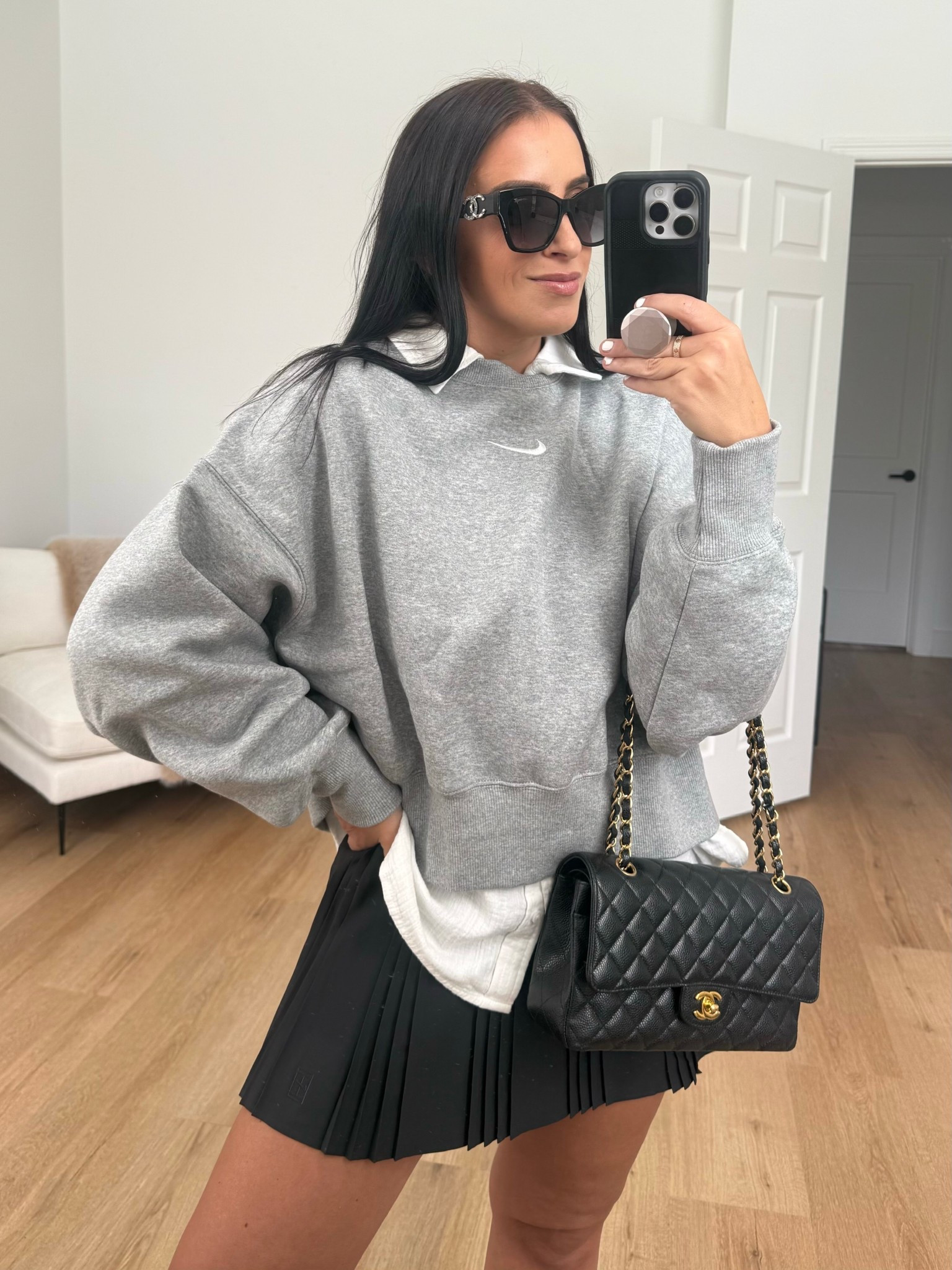 Nike Sportswear Phoenix Fleece
Women's Over-Oversized Crew-Neck Sweatshirt wearing size small. NikeCourt Advantage Women's Dri-FIT Pleated Tennis Skirt size medium. 